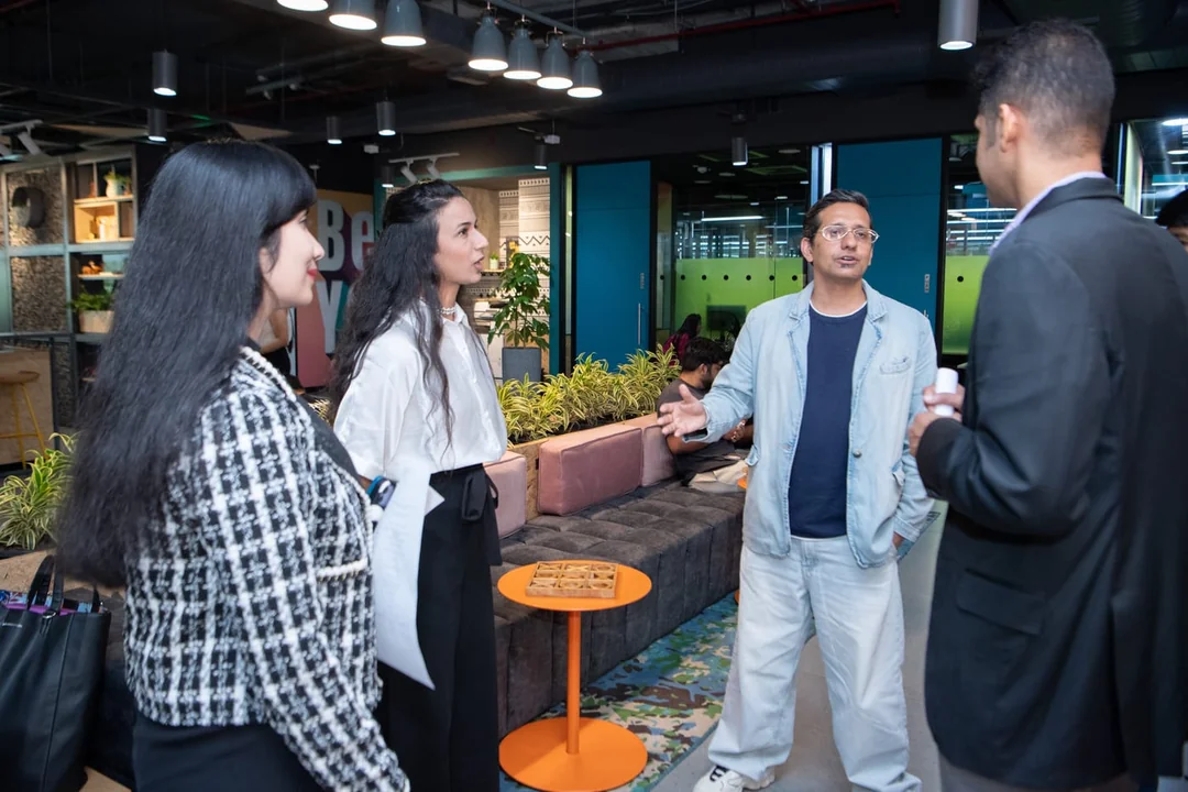 A small group of attendees exchanging thoughts during networking at LFTG Bengaluru